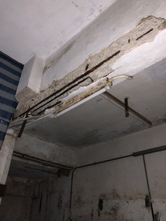The dilapidated condition of outdoor and indoor areas of the buildings at Nos. 4 – 10 Wa In Fong West (photos taken on 13 February 2018).